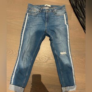 Stylish Blue Distressed Women Jeans with silver stripe on side